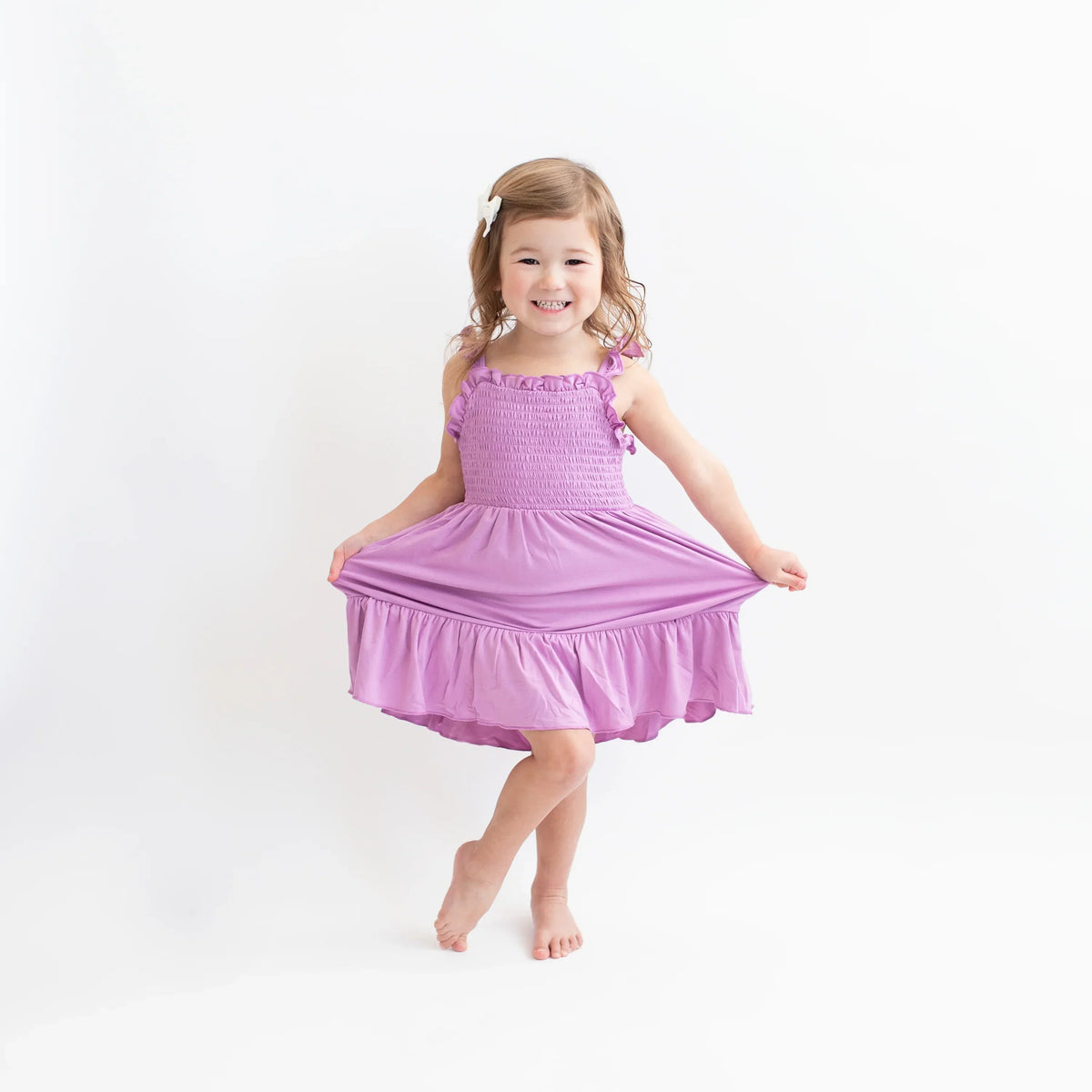 Smocked Dress in Poi