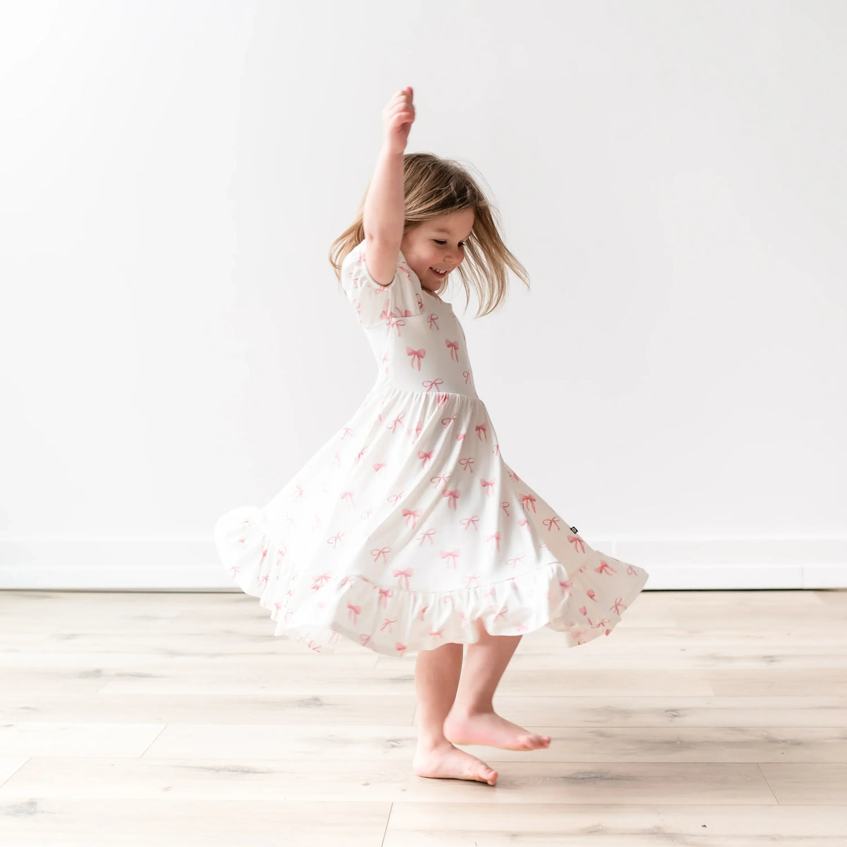Puff Sleeve Twirl Dress in Bow